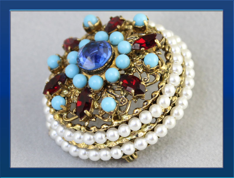 West-Germany-round-cushion-brooch-with-red-blue-RS-and-pearls